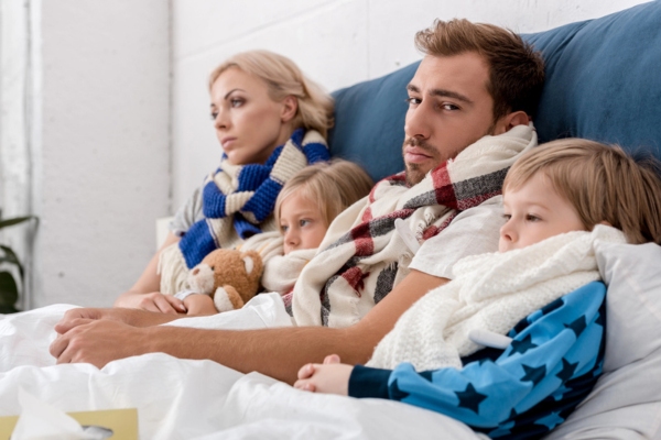 family feeling cold, wearing scarf indoor due to heat pump not functioning properly