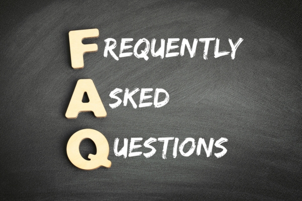 frequently asked questions written on chalkboard depicting common questions about furnace oil smell