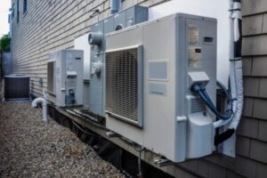 image of heat pumps installed on the side of the house